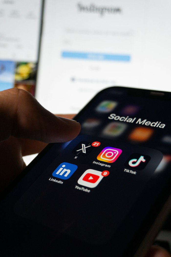 A phone showing social media apps